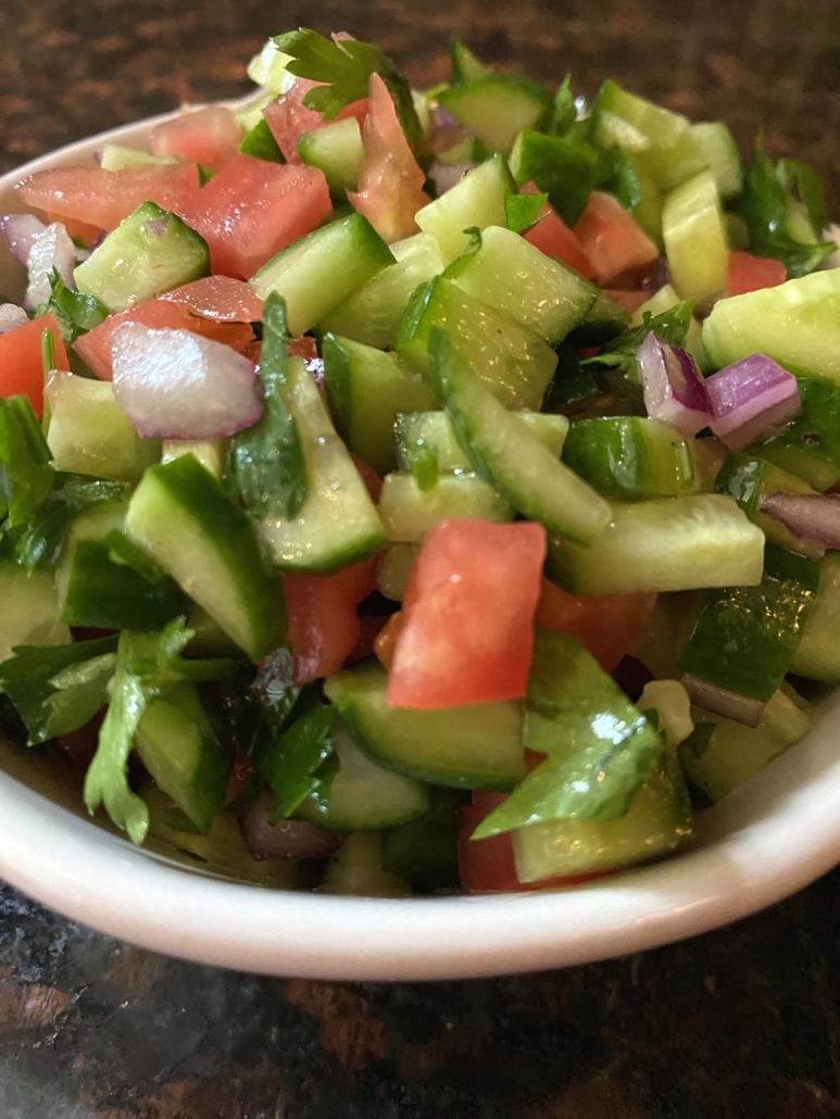 fresh chopped Persian cucumbers, roma tomatoes, and onion