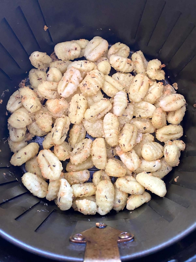 Air Fryer Gnocchi seasoned with grated parmesan and Italian seasoning