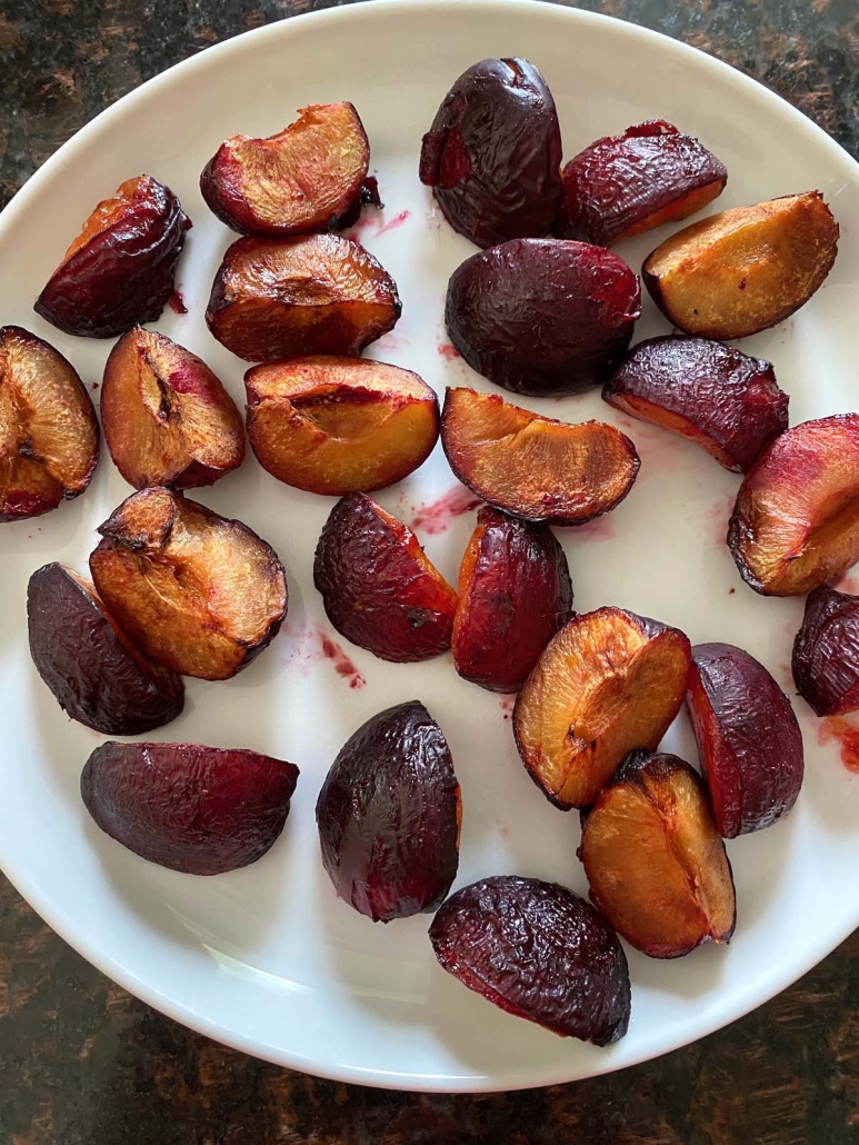 roasted plums on a plate