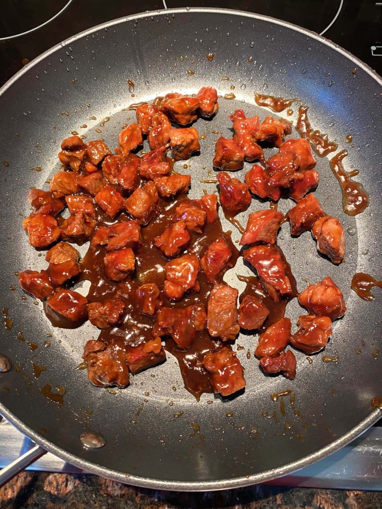 Beef Teriyaki cooking in a skillet