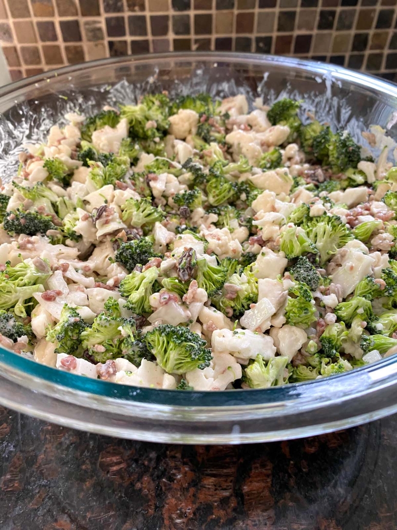 mixing bowl of Broccoli Cauliflower Salad