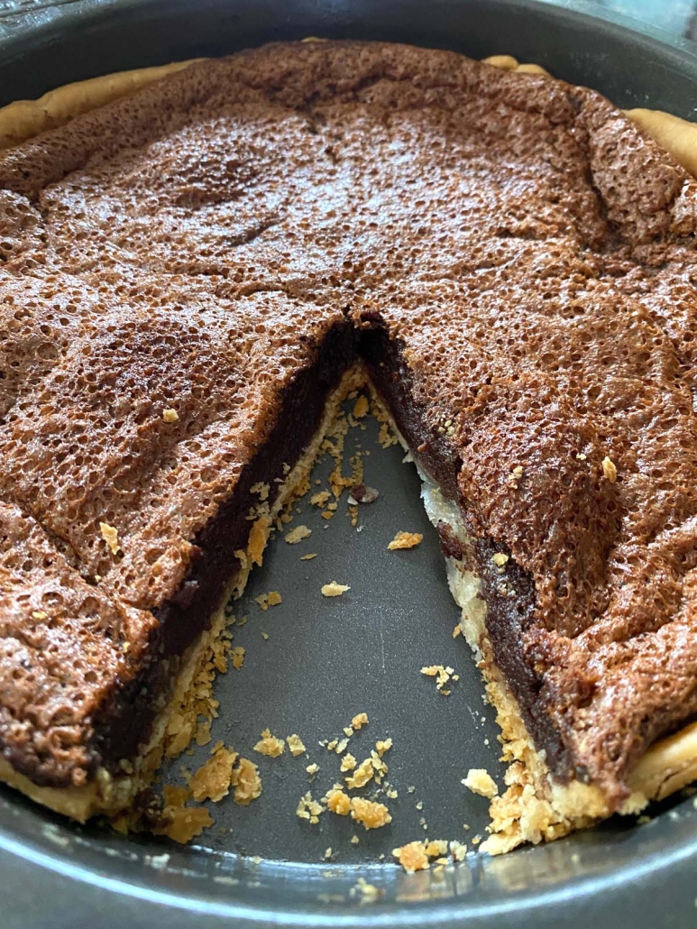 Chocolate Chess Pie with slice cut out