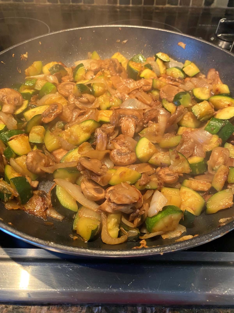 Hibachi Vegetables sizzling in a pan