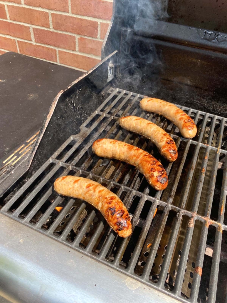 Italian sausages on the grill