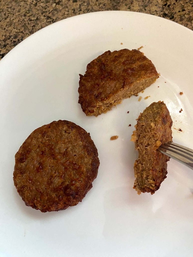 forking holding piece of Beyond Burger