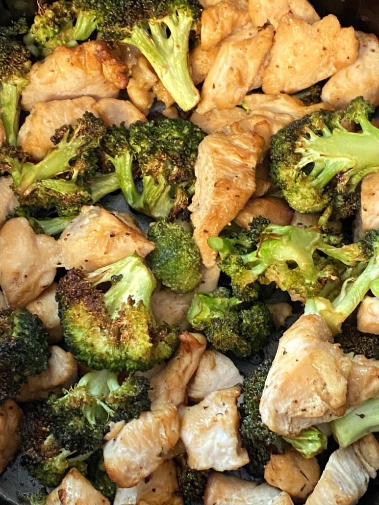 close-up of cooked chicken and broccoli