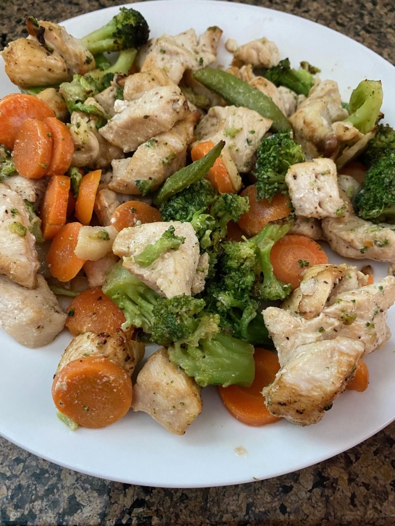 Air Fryer Chicken And Frozen Vegetables on a plate