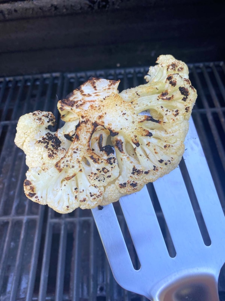 spatula holding Grilled Cauliflower Steak