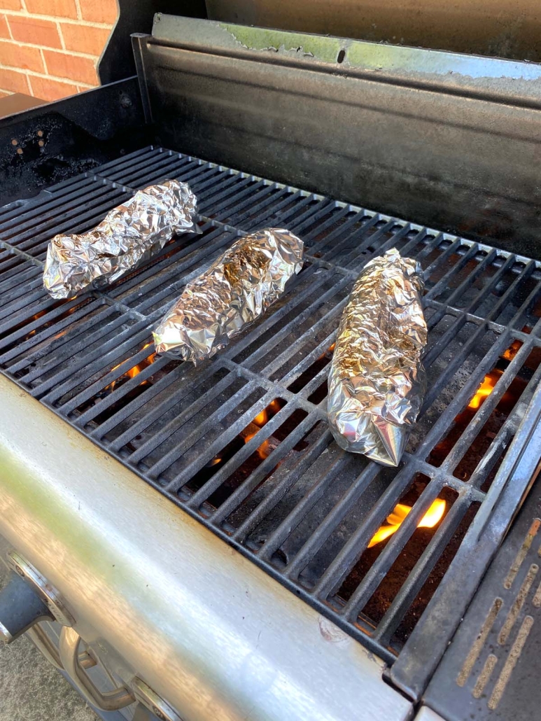 Corn In Foil getting flame grilled