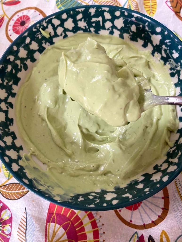 spoon scooping up Avocado Crema