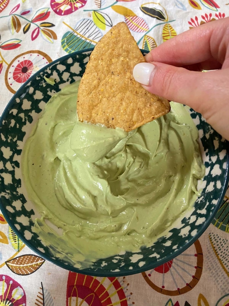 chip dipped into Avocado Crema