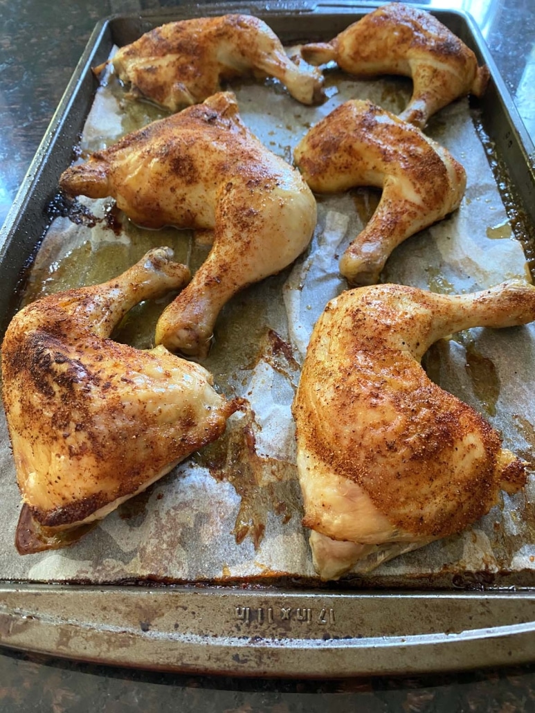 Baked Chicken Leg Quarters on a baking sheet