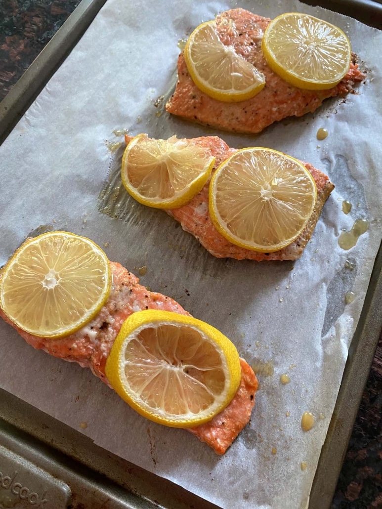 slices of lemon on Baked Sockeye Salmon