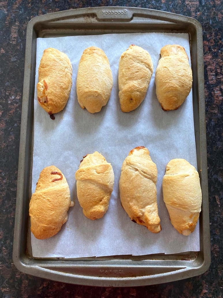 golden brown Pizza Crescent Rolls on a baking sheet