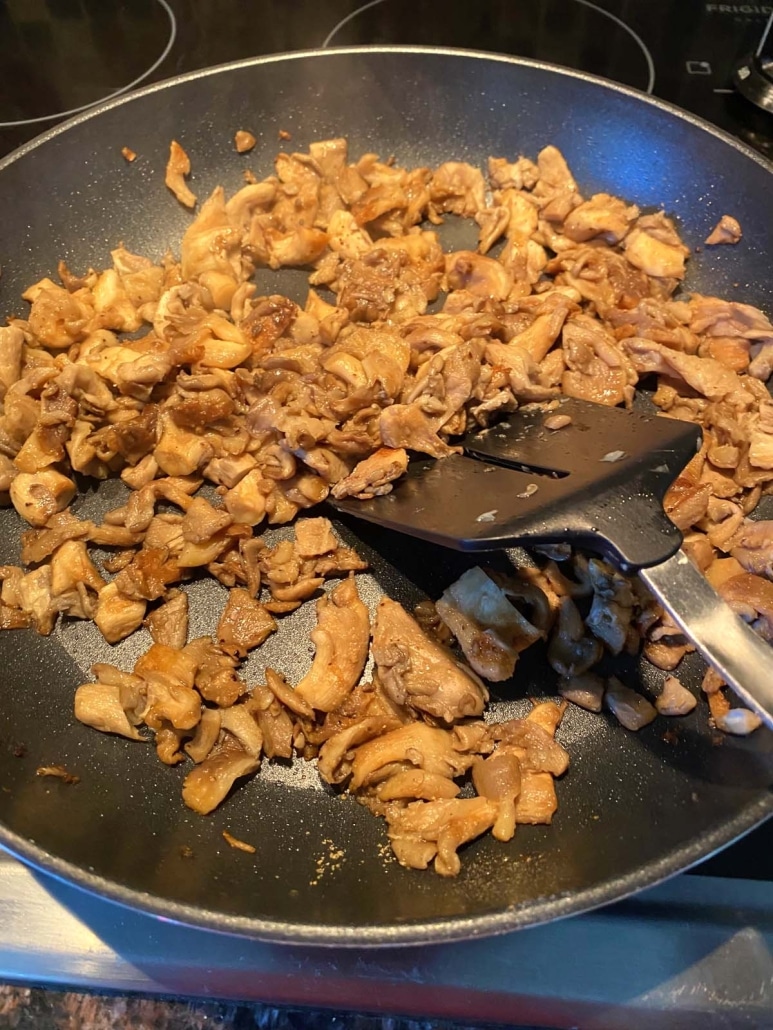 spatula mixing up Pan Fried Oyster Mushrooms