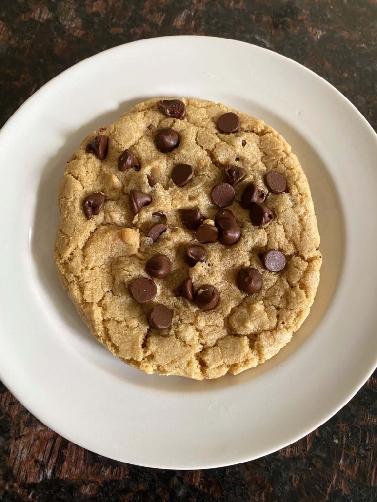 large Dairy Free Chocolate Chip Cookie on a plate