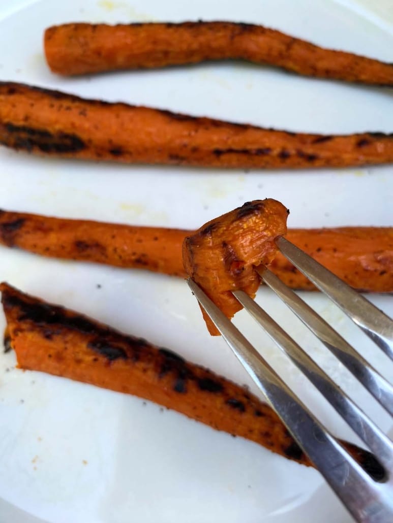 fork holding piece of Grilled Carrot