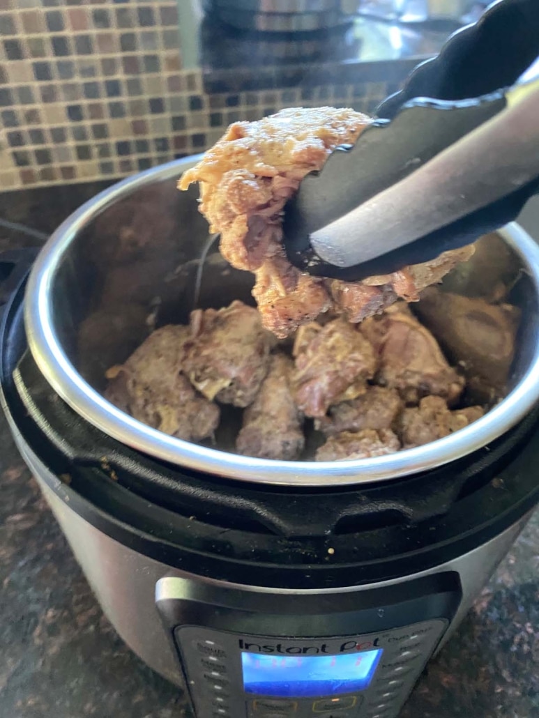 pulling cooked turkey neck out of instant pot