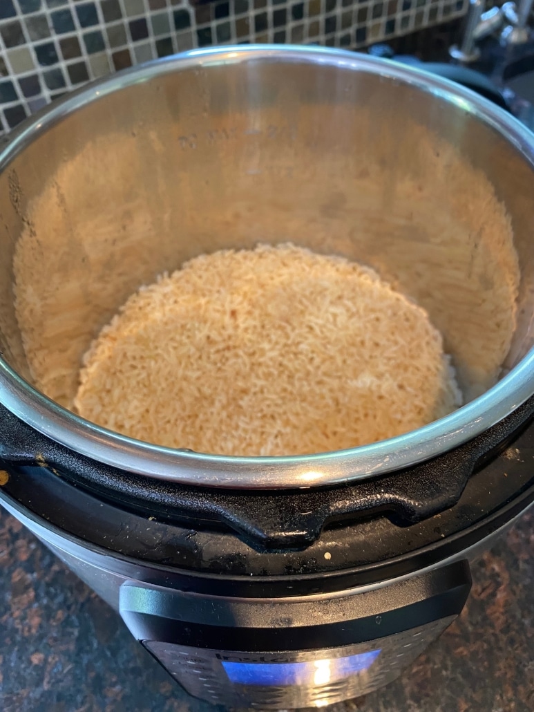 https://www.melaniecooks.com/wp-content/uploads/2023/09/Jasmine-Brown-Rice-In-Instant-Pot-1-773x1030.jpg