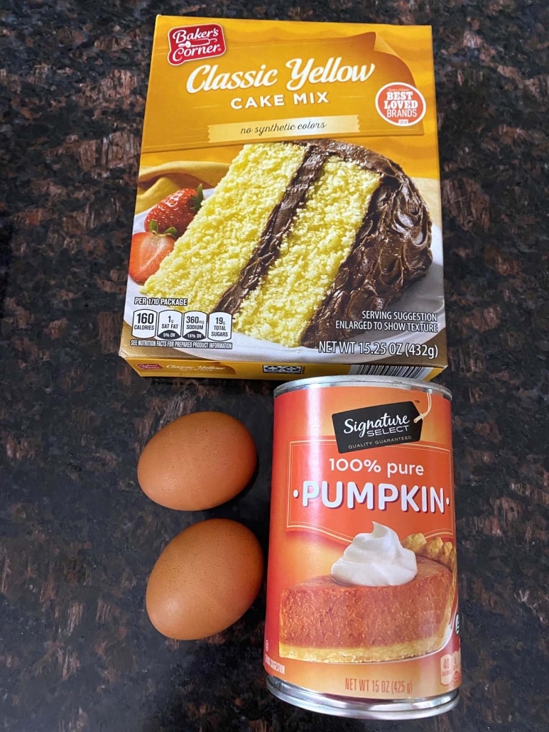 box of yellow cake mix, eggs, and pumpkin puree