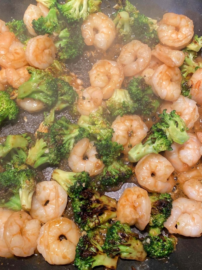 Shrimp And Broccoli Stir Fry sizzling in the pan