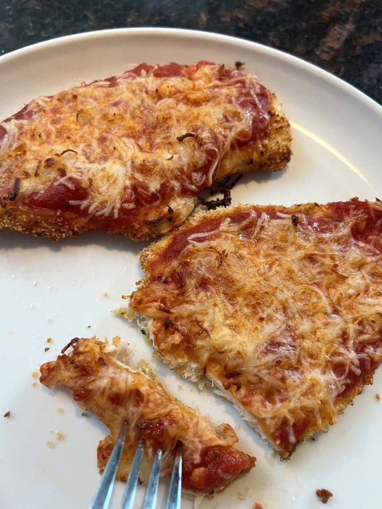 Air Fryer Chicken Parmesan with a slice cut off