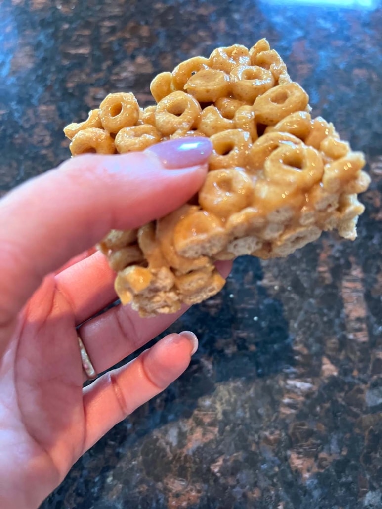 hand holding Cheerios Peanut Butter Bar