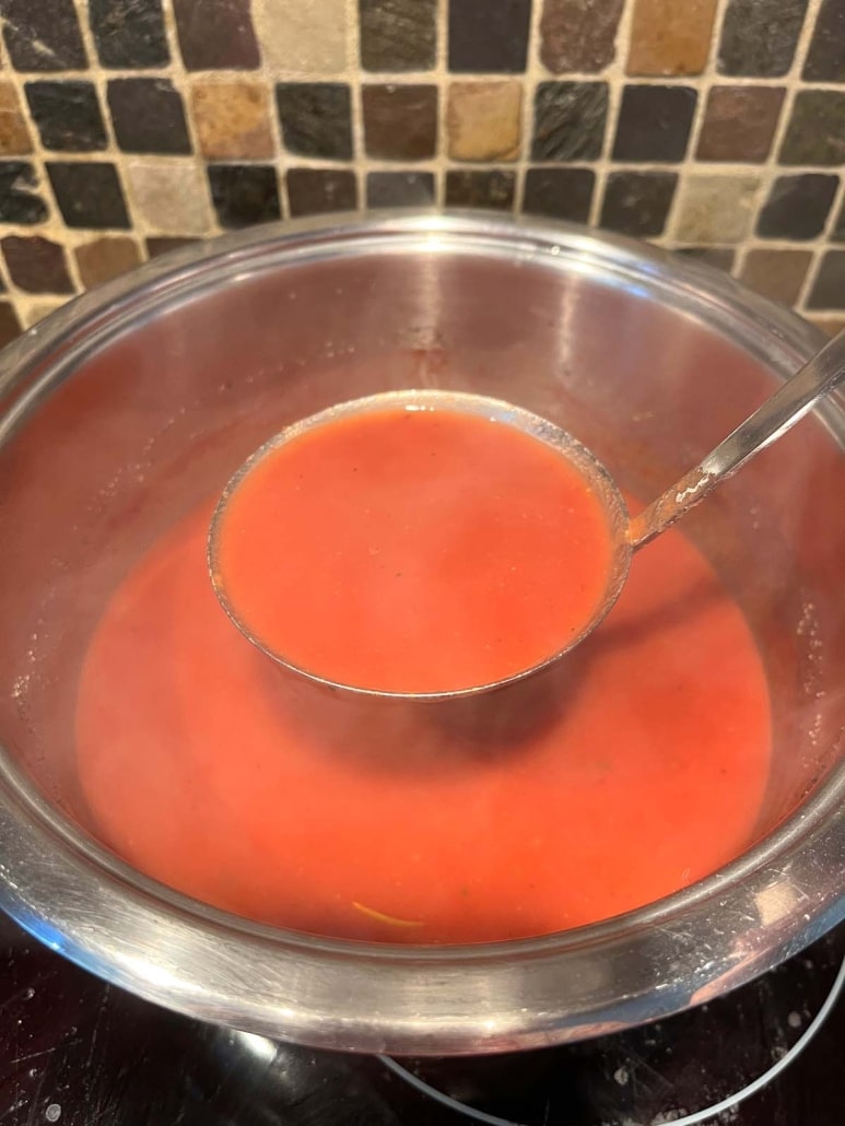 ladle with easy tomato soup