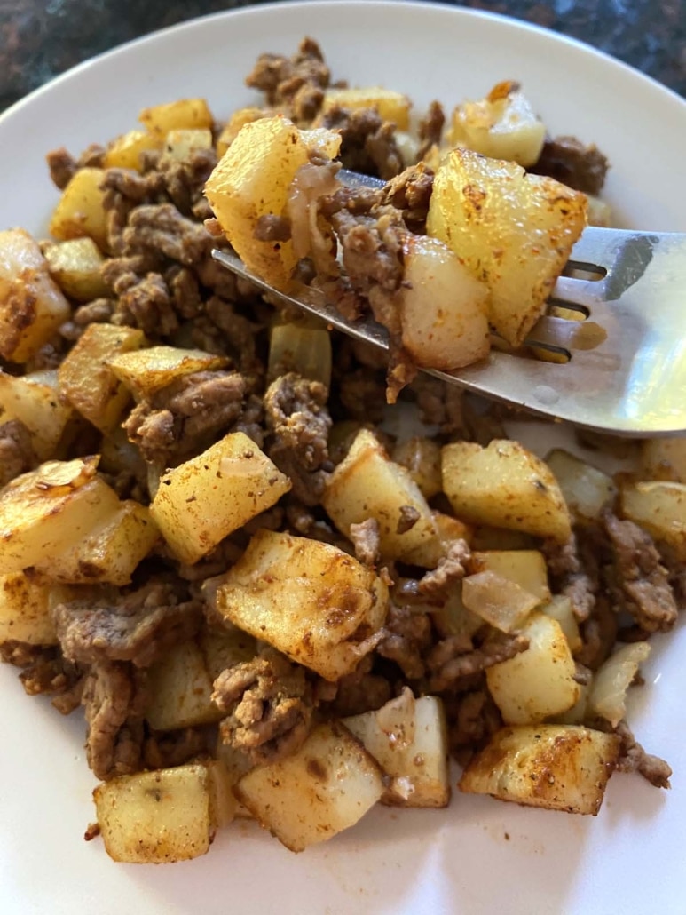 forkful of easy dish Ground Beef And Potatoes