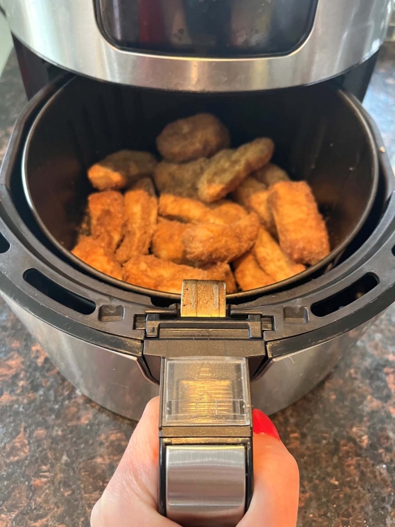 air fryer opened to show finished churros made with puff pastry