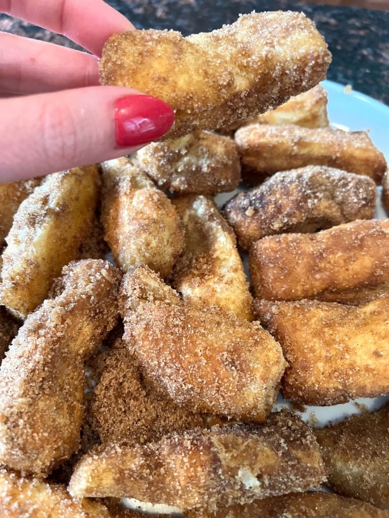 hand holding easy snack Air Fryer Churros