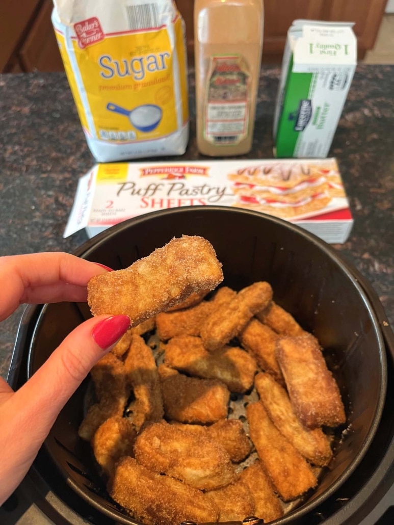 hand holding Air Fryer Churro next to ingredients