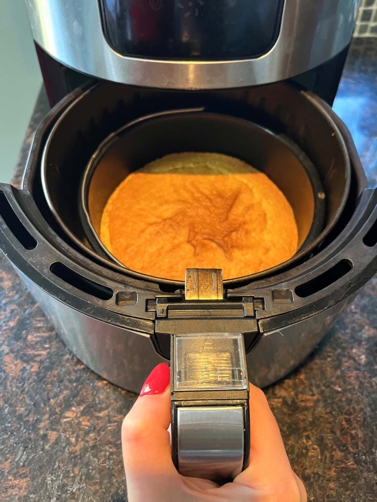 air fryer opened to show yummy side dish baked cornbread