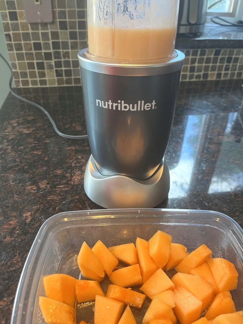 Making cantaloupe smoothie in a blender