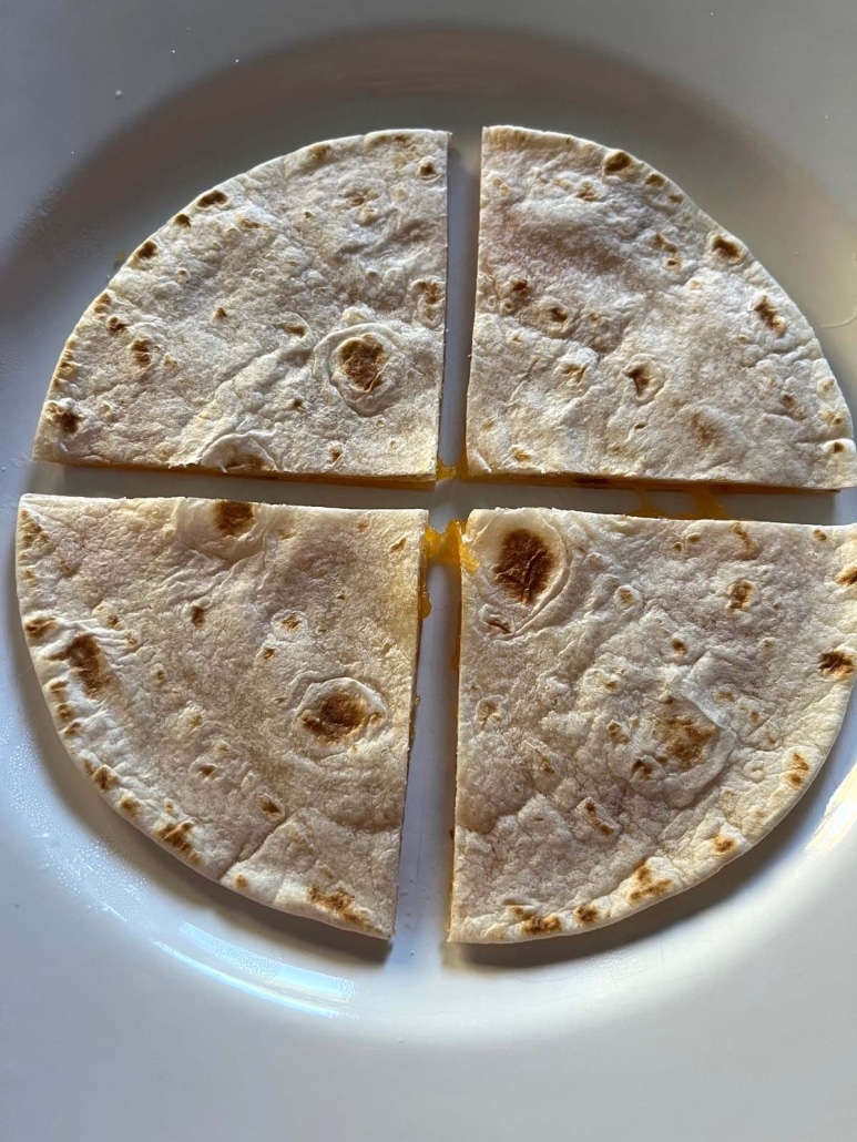 Microwave Cheese Quesadilla cut into 4 quarters