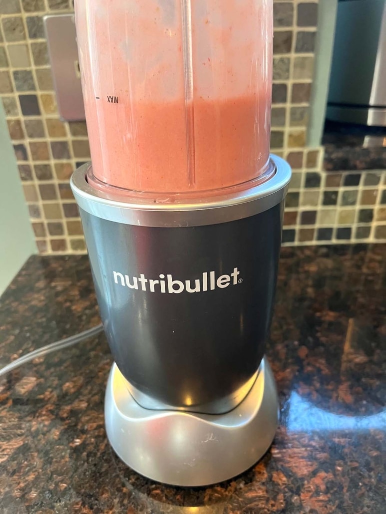 blender mixing up Strawberry Pineapple Smoothie