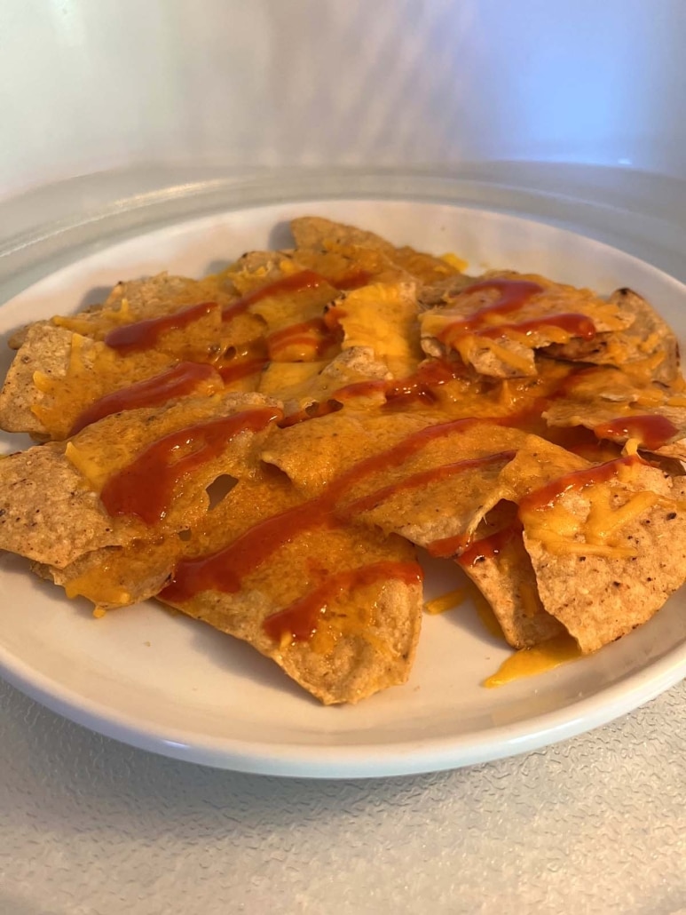 plate of nachos in microwave