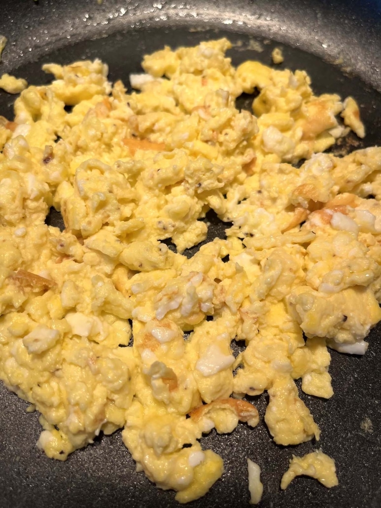 seasoned Scrambled Eggs With Cottage Cheese in a skillet