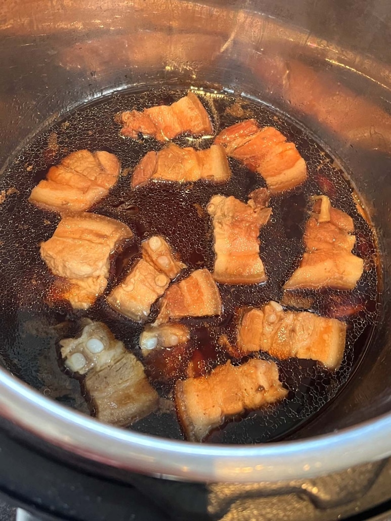 cooked pork belly pieces in soy sauce and brown sugar marinade