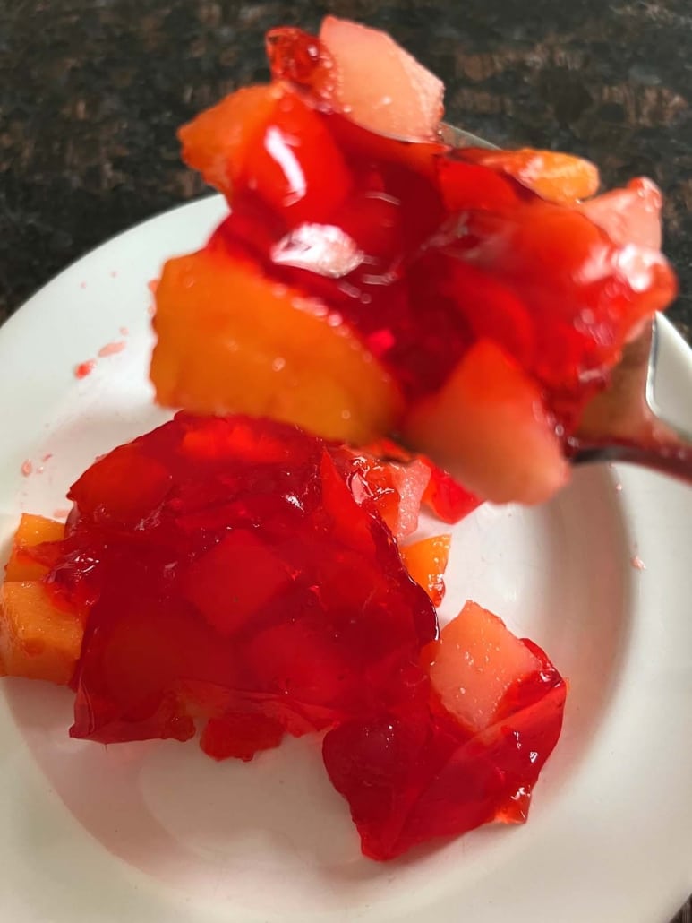 forkful of Jello With Fruit Cocktail
