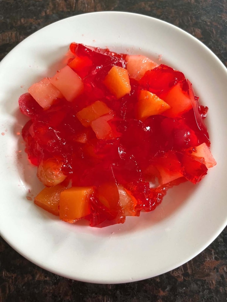 plate of easy dessert Jello With Fruit Cocktail