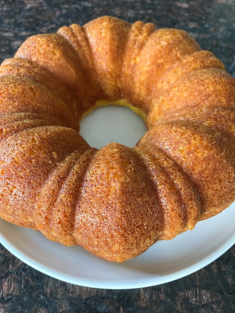 baked lemon bundt cake on a plate