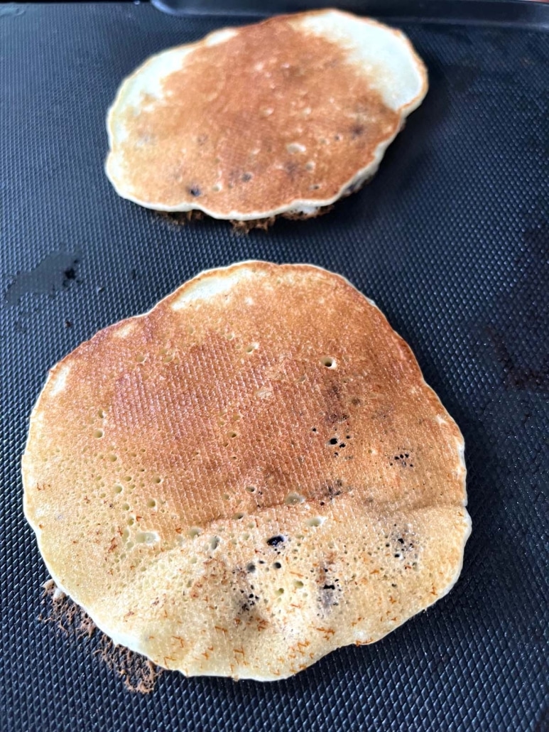 Muffin Mix Pancakes on a griddle