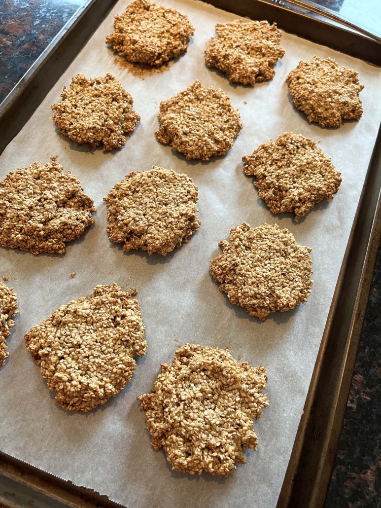 cookie sheet with Sesame Cookies on top