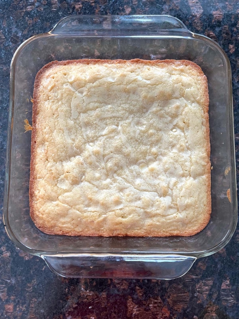Vanilla Brownies With White Chocolate Chips baked in a pan