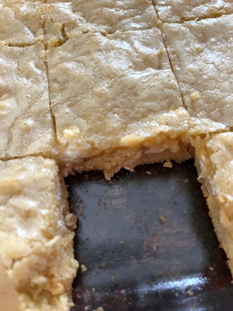 pan of Vanilla Brownies with a piece cut out