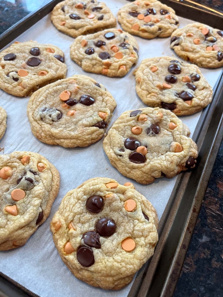 baking sheet with chewy Caramel Chocolate Chip Cookies on top