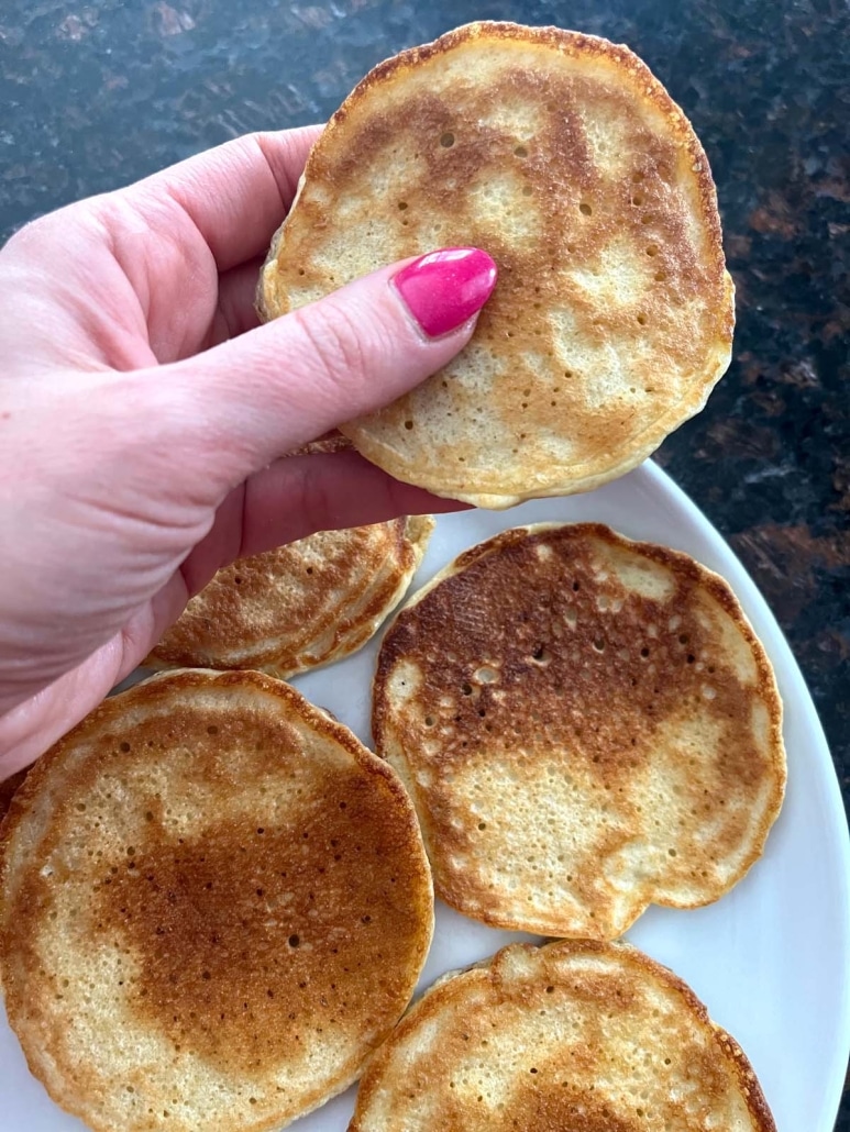 hand holding a yummy Cottage Cheese Pancake