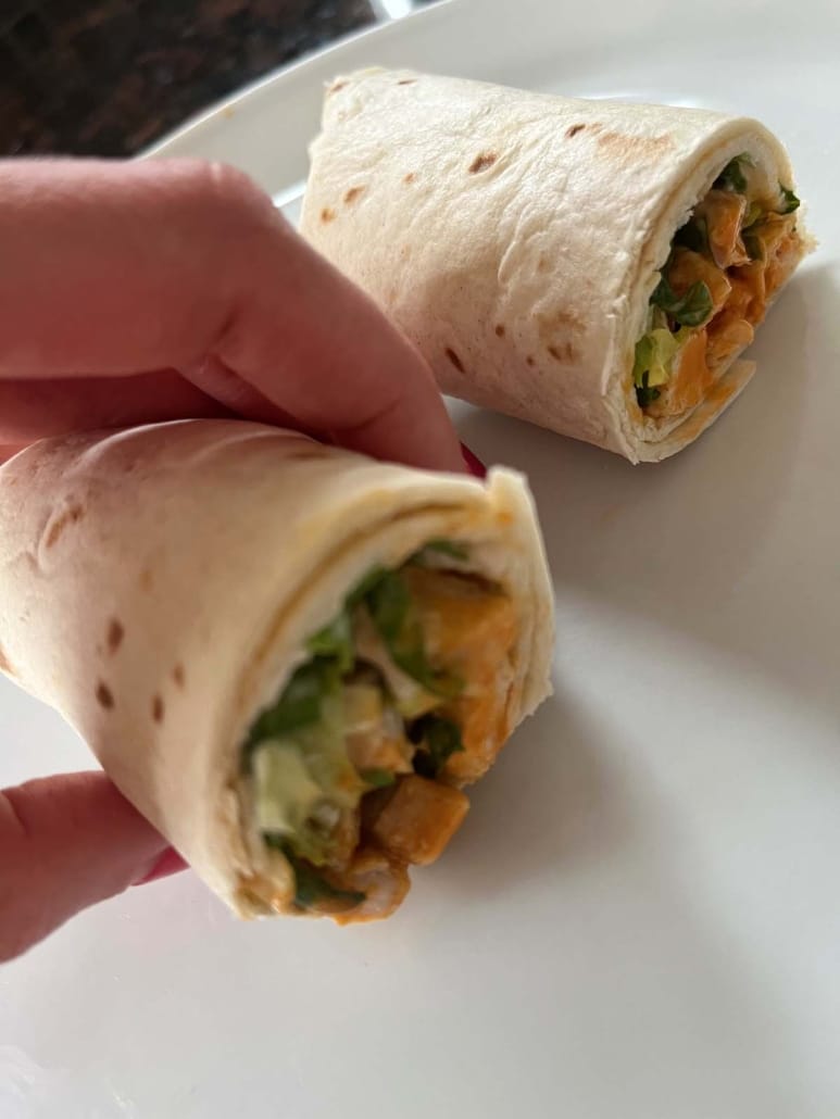 hand holding a homemade Buffalo Chicken Wrap