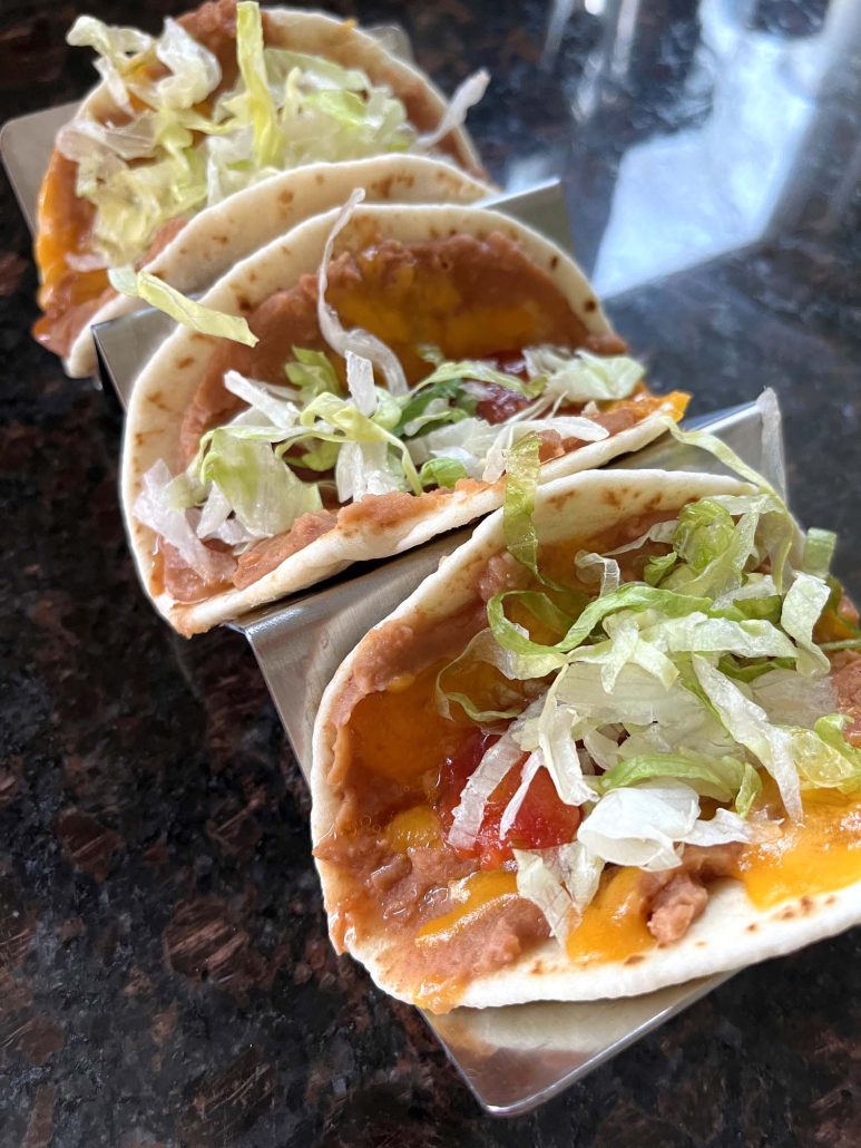 homemade refried bean and cheese tacos